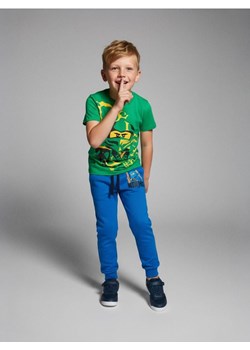 Sinsay - Spodnie jogger z nadrukiem Lego Ninjago - niebieski - id: 601FF-95X - marki Sinsay - 186558024 Sinsay - Spodnie jogger z nadrukiem Lego Ninjago - niebieski ze sklepu Sinsay w kategorii Spodnie chłopięce - zdjęcie 186558024