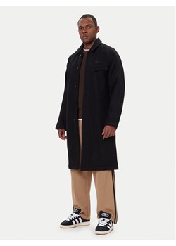 adidas Płaszcz przejściowy Premium Essentials JW0120 Czarny Regular Fit ze sklepu MODIVO w kategorii Płaszcze męskie - zdjęcie 186567341