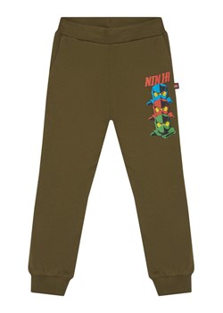LEGO Spodnie dresowe 11010946 Zielony Regular Fit ze sklepu MODIVO w kategorii Spodnie chłopięce - zdjęcie 186595594
