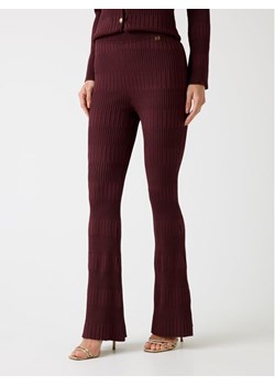 Marciano Guess Spodnie materiałowe 176725 Bordowy Slim Fit ze sklepu MODIVO w kategorii Spodnie damskie - zdjęcie 186636603