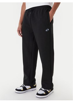DC Shoes Spodnie dresowe Dive In Sweatpant EDYFB03095 Czarny Regular Fit ze sklepu MODIVO w kategorii Spodnie męskie - zdjęcie 186690834