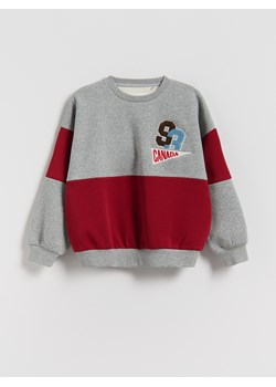 Reserved - Ocieplana bluza z nadrukiem - jasnoszary - id: 955FJ-09M - marki Reserved - 186714954 Reserved - Ocieplana bluza z nadrukiem - jasnoszary ze sklepu Reserved w kategorii Bluzy chłopięce - zdjęcie 186714954