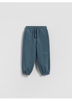 Reserved - Ocieplane spodnie jogger - granatowy - id: 154FI-95X - marki Reserved - 186733494 Reserved - Ocieplane spodnie jogger - granatowy ze sklepu Reserved w kategorii Spodnie chłopięce - zdjęcie 186733494