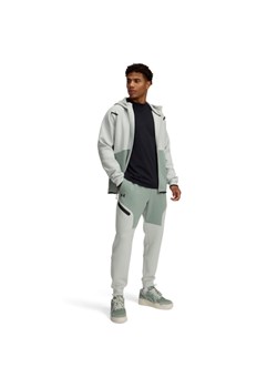 Męskie spodnie treningowe Under Armour UA Unstoppable Flc Jgr Eu - zielone ze sklepu Sportstylestory.com w kategorii Spodnie męskie - zdjęcie 186805431