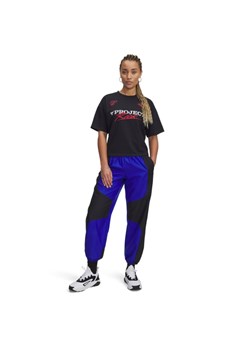 Damskie spodnie treningowe Under Armour Project Rock Woven Bottom - niebieskie ze sklepu Sportstylestory.com w kategorii Spodnie damskie - zdjęcie 186819422