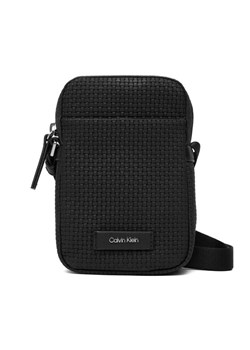 Saszetka Calvin Klein Embossed Woven Slim Reporter LV04D3221G Czarny - id: 8721224850517 - marki Calvin Klein - 187188051 Saszetka Calvin Klein Embossed Woven Slim Reporter LV04D3221G Czarny ze sklepu eobuwie.pl w kategorii Saszetki - zdjęcie 187188051