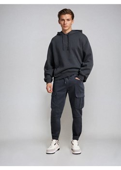 Sinsay - Jeansy regular jogger cargo - niebieski - id: 452FB-57X - marki Sinsay - 187266324 Sinsay - Jeansy regular jogger cargo - niebieski ze sklepu Sinsay w kategorii Jeansy męskie - zdjęcie 187266324