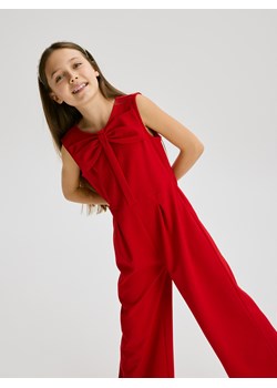 Reserved - Kombinezon z kokardą - czerwony ze sklepu Reserved w kategorii Kombinezony dziewczęce - zdjęcie 187292600