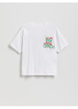 Reserved - Świąteczny t-shirt Grinch - biały ze sklepu Reserved w kategorii Bluzki dziewczęce - zdjęcie 187292634