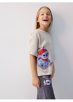 Reserved - Świąteczny t-shirt Lilo i Stitch - beżowy ze sklepu Reserved w kategorii Bluzki dziewczęce - zdjęcie 187292682