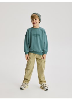 Reserved - Bluza z nadrukiem - morski - id: 963FJ-67X - marki Reserved - 187296590 Reserved - Bluza z nadrukiem - morski ze sklepu Reserved w kategorii Bluzy chłopięce - zdjęcie 187296590