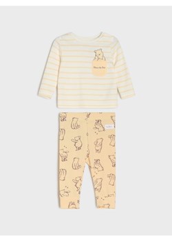 Sinsay - Komplet: koszulka i legginsy Winnie The Pooh - kremowy - id: 892FW-01X - marki Sinsay - 187297220 Sinsay - Komplet: koszulka i legginsy Winnie The Pooh - kremowy ze sklepu Sinsay w kategorii Odzież dla niemowląt - zdjęcie 187297220