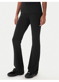 Juicy Couture Legginsy Steven JCWBJ225314 Czarny Slim Fit - id: 0000305589118 - marki Juicy Couture - 187306274 Juicy Couture Legginsy Steven JCWBJ225314 Czarny Slim Fit ze sklepu MODIVO w kategorii Spodnie damskie - zdjęcie 187306274