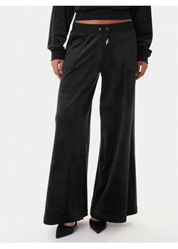 Juicy Couture Spodnie dresowe JCBBJ225803 Czarny Wide Leg - id: 0000305589361 - marki Juicy Couture - 187306332 Juicy Couture Spodnie dresowe JCBBJ225803 Czarny Wide Leg ze sklepu MODIVO w kategorii Spodnie damskie - zdjęcie 187306332