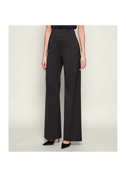 HUGO Spodnie Himia | flare fit | z dodatkiem wełny - id: BU255W000148001 - marki Hugo Boss - 187327201 HUGO Spodnie Himia | flare fit | z dodatkiem wełny ze sklepu Gomez Fashion Store w kategorii Spodnie damskie - zdjęcie 187327201