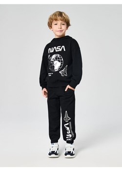 Sinsay - Spodnie dresowe jogger NASA - czarny ze sklepu Sinsay w kategorii Spodnie chłopięce - zdjęcie 187333262