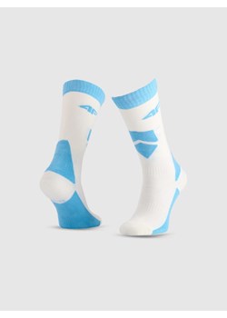 Dziewczęce skarpetki narciarskie 4F 4FJWAW25UFSOF228 - niebieskie ze sklepu Sportstylestory.com w kategorii Skarpetki dziecięce - zdjęcie 187343041