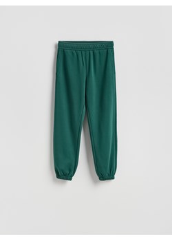 Reserved - Spodnie dresowe z bawełną - ciemnozielony ze sklepu Reserved w kategorii Spodnie damskie - zdjęcie 187353590