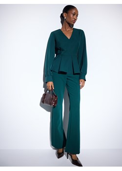 Mohito - Butelkowe spodnie flare - ciemny zielony ze sklepu Mohito w kategorii Spodnie damskie - zdjęcie 187365892