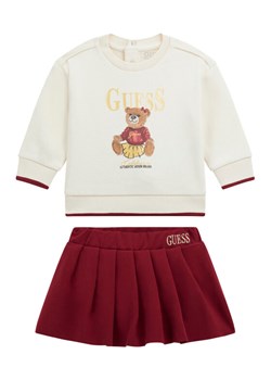 Guess Komplet bluza i spódniczka A5BG01 KAD74 Écru Regular Fit ze sklepu MODIVO w kategorii Komplety niemowlęce - zdjęcie 187376654