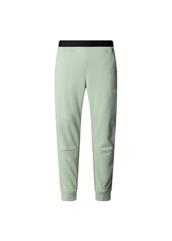 Spodnie męskie The North Face Mountain Athletics 0A893SD5M1 - zielone ze sklepu streetstyle24.pl w kategorii Spodnie męskie - zdjęcie 187377613