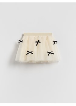 Reserved - Tiulowa spódnica z kokardkami - kremowy ze sklepu Reserved w kategorii Sukienki dziewczęce - zdjęcie 187381161