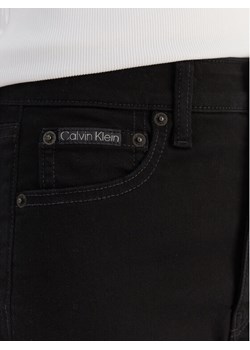 Calvin Klein Jeans Jeansy LV047D740G Czarny Slim Fit ze sklepu MODIVO w kategorii Jeansy damskie - zdjęcie 187388472