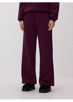 Reserved - Spodnie dresowe - ciemnofioletowy ze sklepu Reserved w kategorii Spodnie damskie - zdjęcie 187395461