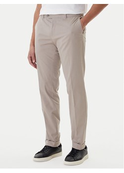 BOSS Spodnie materiałowe C-Genius 50555035 Beżowy Slim Fit ze sklepu MODIVO w kategorii Spodnie męskie - zdjęcie 187481331
