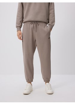 Reserved - Spodnie dresowe comfort fit - ciemnoszary ze sklepu Reserved w kategorii Spodnie męskie - zdjęcie 187496754