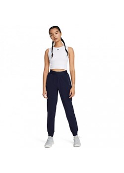 Damskie spodnie treningowe Under Armour Sport High Rise Woven Pant - granatowe ze sklepu Sportstylestory.com w kategorii Spodnie damskie - zdjęcie 187500562