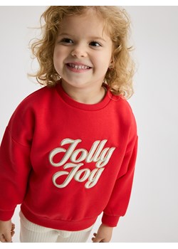 Reserved - Bluza ze świątecznym napisem - czerwony ze sklepu Reserved w kategorii Bluzy dziewczęce - zdjęcie 187508800