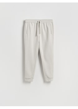 Reserved - Spodnie dresowe slim fit - jasnoszary ze sklepu Reserved w kategorii Spodnie męskie - zdjęcie 187511112