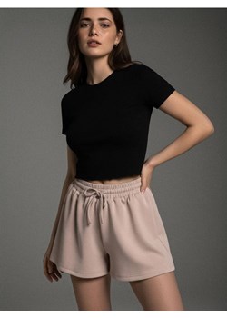 Sinsay - Szorty dresowe z luźnymi nogawkami soft touch - beżowy ze sklepu Sinsay w kategorii Szorty - zdjęcie 187513612