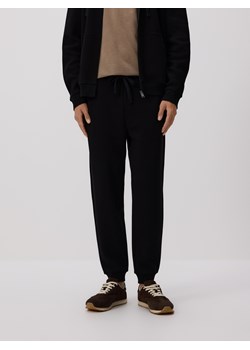 Reserved - Dresowe spodnie jogger z bawełną - czarny ze sklepu Reserved w kategorii Spodnie męskie - zdjęcie 187516912