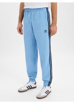 adidas Originals Męskie spodnie dresowe - Firebird Mężczyźni jasnoniebieski jednolity ze sklepu vangraaf w kategorii Spodnie męskie - zdjęcie 187521803