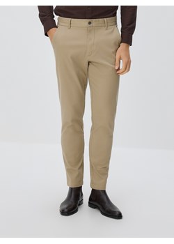 Reserved - Bawełniane spodnie slim fit - beżowy ze sklepu Reserved w kategorii Spodnie męskie - zdjęcie 187522794