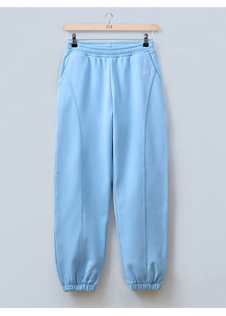 LeGer Spodnie dresowe "Nora" w kolorze błękitnym ze sklepu Limango Polska w kategorii Spodnie damskie - zdjęcie 187523622