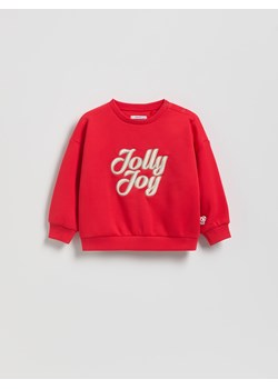 Reserved - Bluza ze świątecznym napisem - czerwony ze sklepu Reserved w kategorii Bluzy dziewczęce - zdjęcie 187524320