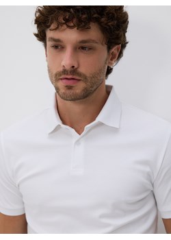 Reserved - Polo slim z bawełny pima - złamana biel ze sklepu Reserved w kategorii T-shirty męskie - zdjęcie 187527860