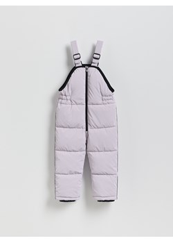 Reserved - Gumowane spodnie na szelkach - lawendowy ze sklepu Reserved w kategorii Spodnie dziewczęce - zdjęcie 187541293
