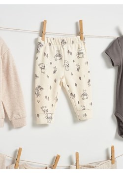 Sinsay - Spodnie z polarem w środku Winnie the Pooh - kremowy ze sklepu Sinsay w kategorii Odzież dla niemowląt - zdjęcie 187561644