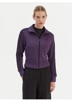 adidas Bluza Firebird Adicolor JY2615 Fioletowy Regular Fit ze sklepu MODIVO w kategorii Bluzy damskie - zdjęcie 187562581