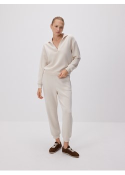 Reserved - Dresowe spodnie z modalem - beżowy ze sklepu Reserved w kategorii Spodnie damskie - zdjęcie 187576083
