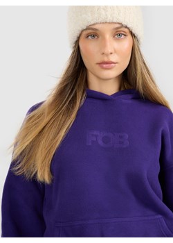 Damski polar z kapturem 4F 4FRAW25TFLEF451 - fioletowy ze sklepu Sportstylestory.com w kategorii Bluzy damskie - zdjęcie 187580471