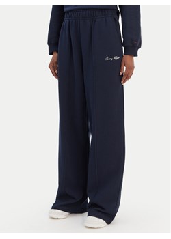 Tommy Hilfiger Spodnie dresowe Script WW0WW48784 Niebieski Relaxed Fit ze sklepu MODIVO w kategorii Spodnie damskie - zdjęcie 187585372