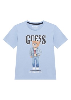 Guess T-Shirt L6RI11 K8HM4 Błękitny Regular Fit ze sklepu MODIVO w kategorii T-shirty chłopięce - zdjęcie 187588693