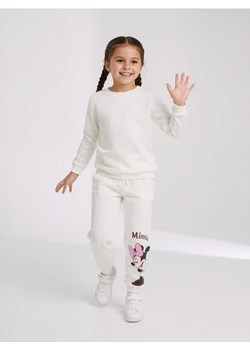 Sinsay - Spodnie dresowe Minnie Mouse - różowy ze sklepu Sinsay w kategorii Spodnie dziewczęce - zdjęcie 187615343