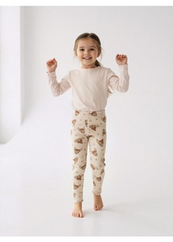 Sinsay - Bawełniane legginsy ze wzorem Bambi - beżowy ze sklepu Sinsay w kategorii Spodnie dziewczęce - zdjęcie 187615344