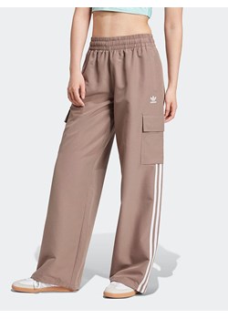 adidas Spodnie dresowe w kolorze jasnobrązowym ze sklepu Limango Polska w kategorii Spodnie damskie - zdjęcie 187625454